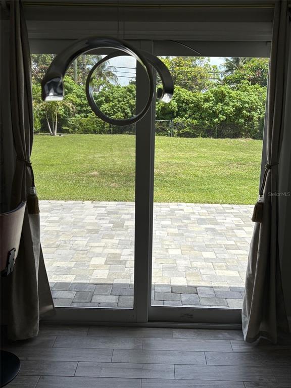 125 Southeast 6th Avenue Boynton Beach, FL 33435 - Photo 24 of 27 a view of lot of trees and small yard