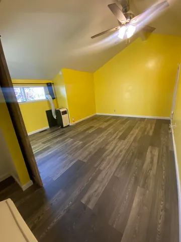 a view of a big room with wooden floor