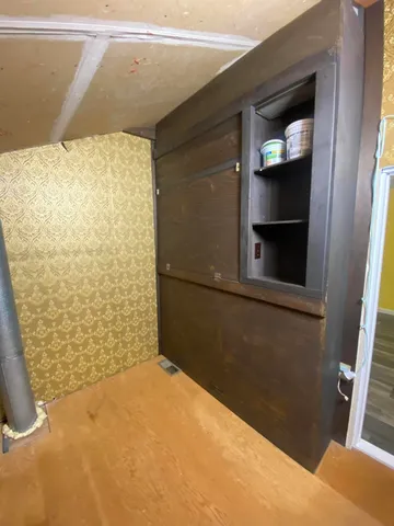 a kitchen with stainless steel appliances a refrigerator and a stove top oven