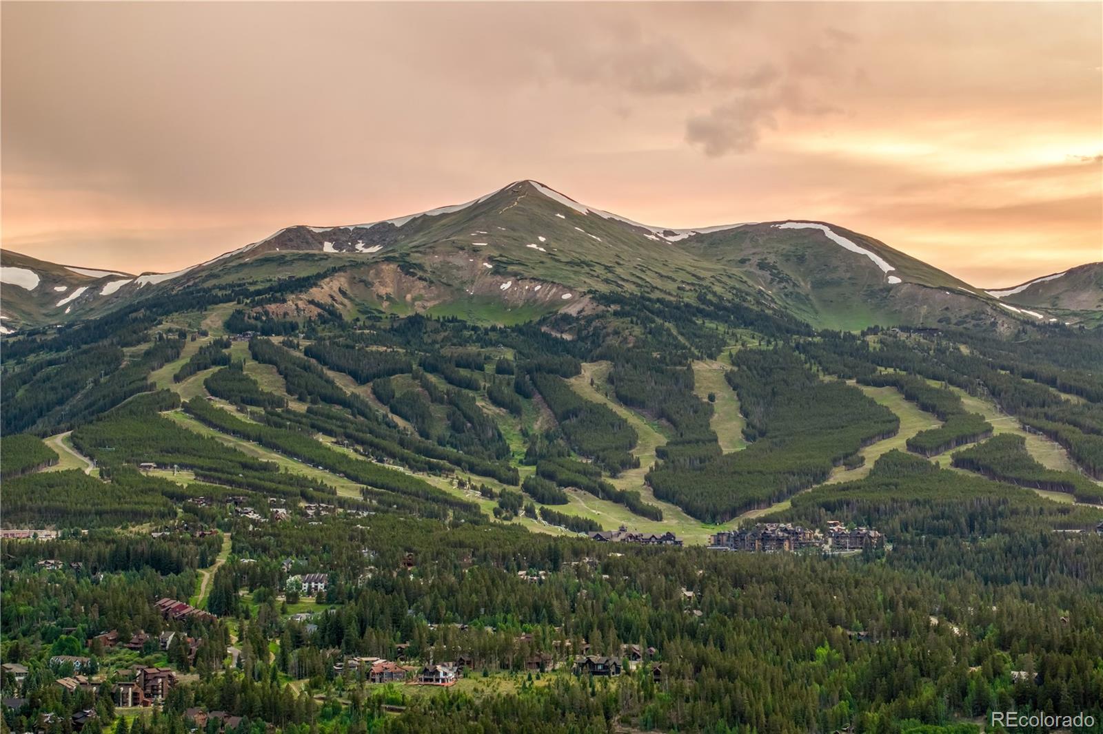 196 Wellington Road Breckenridge, CO 80424 - Photo 16 of 45 a view of a mountain in the distance in a field