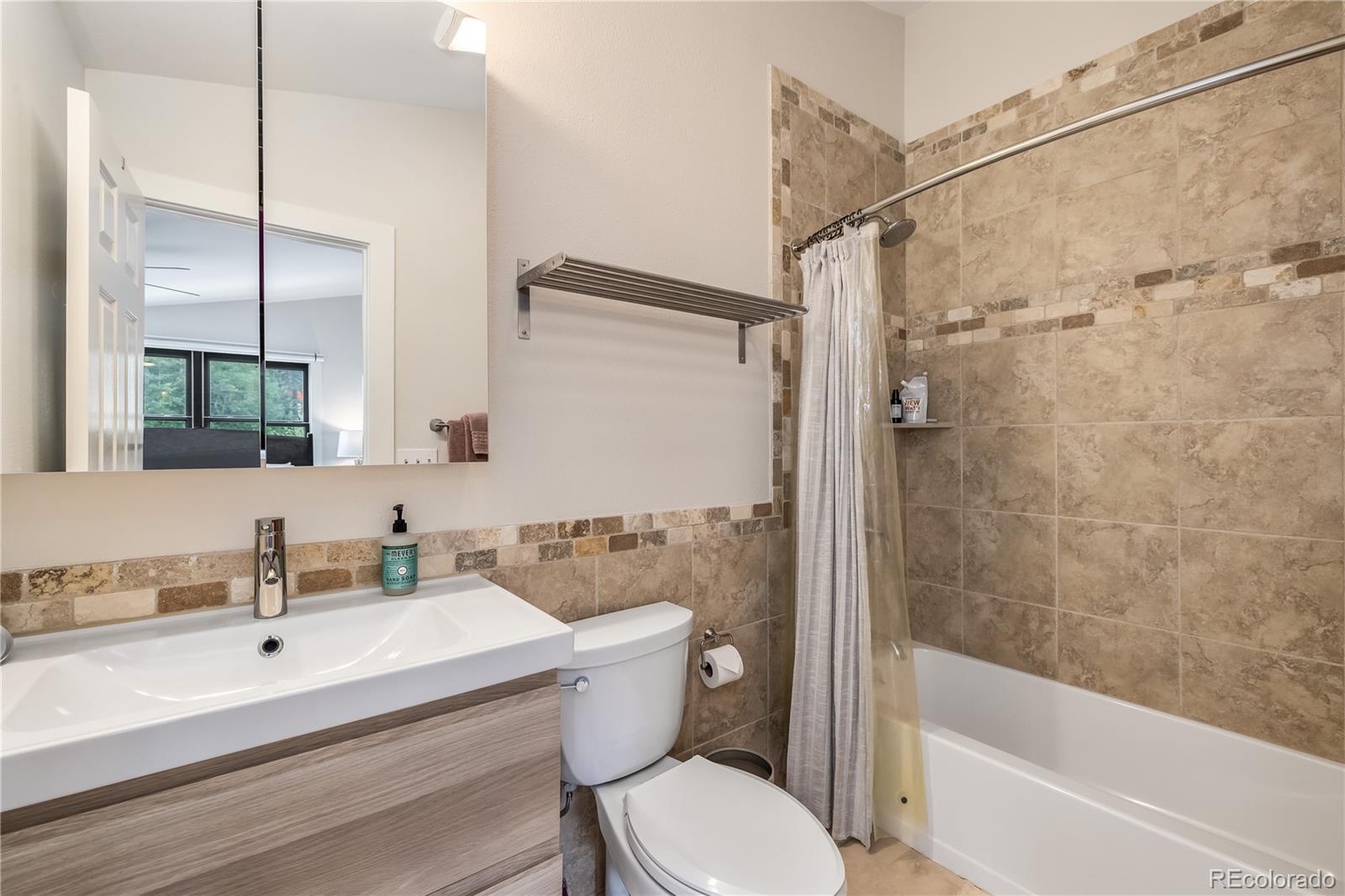 196 Wellington Road Breckenridge, CO 80424 - Photo 20 of 45 a bathroom with a sink toilet and shower