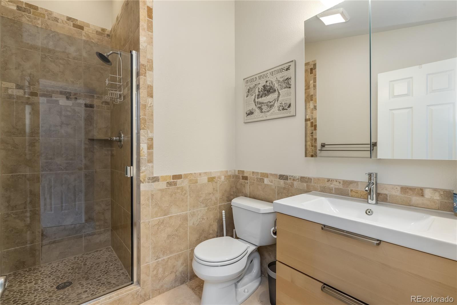196 Wellington Road Breckenridge, CO 80424 - Photo 23 of 45 a bathroom with a sink toilet and shower