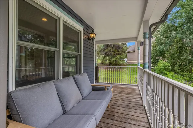 a view of a chairs and table in the patio