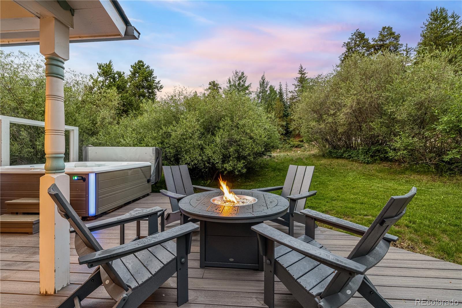 196 Wellington Road Breckenridge, CO 80424 - Photo 30 of 45 a view of a chairs and table in the patio