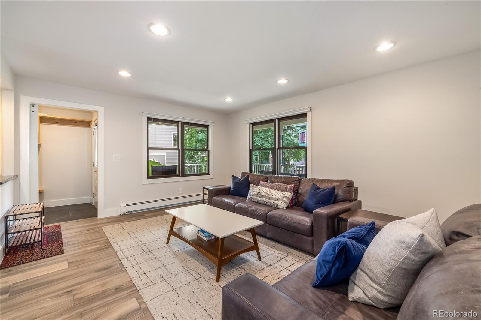 196 Wellington Road Breckenridge, CO 80424 - Photo 4 of 45 a living room with furniture and a window