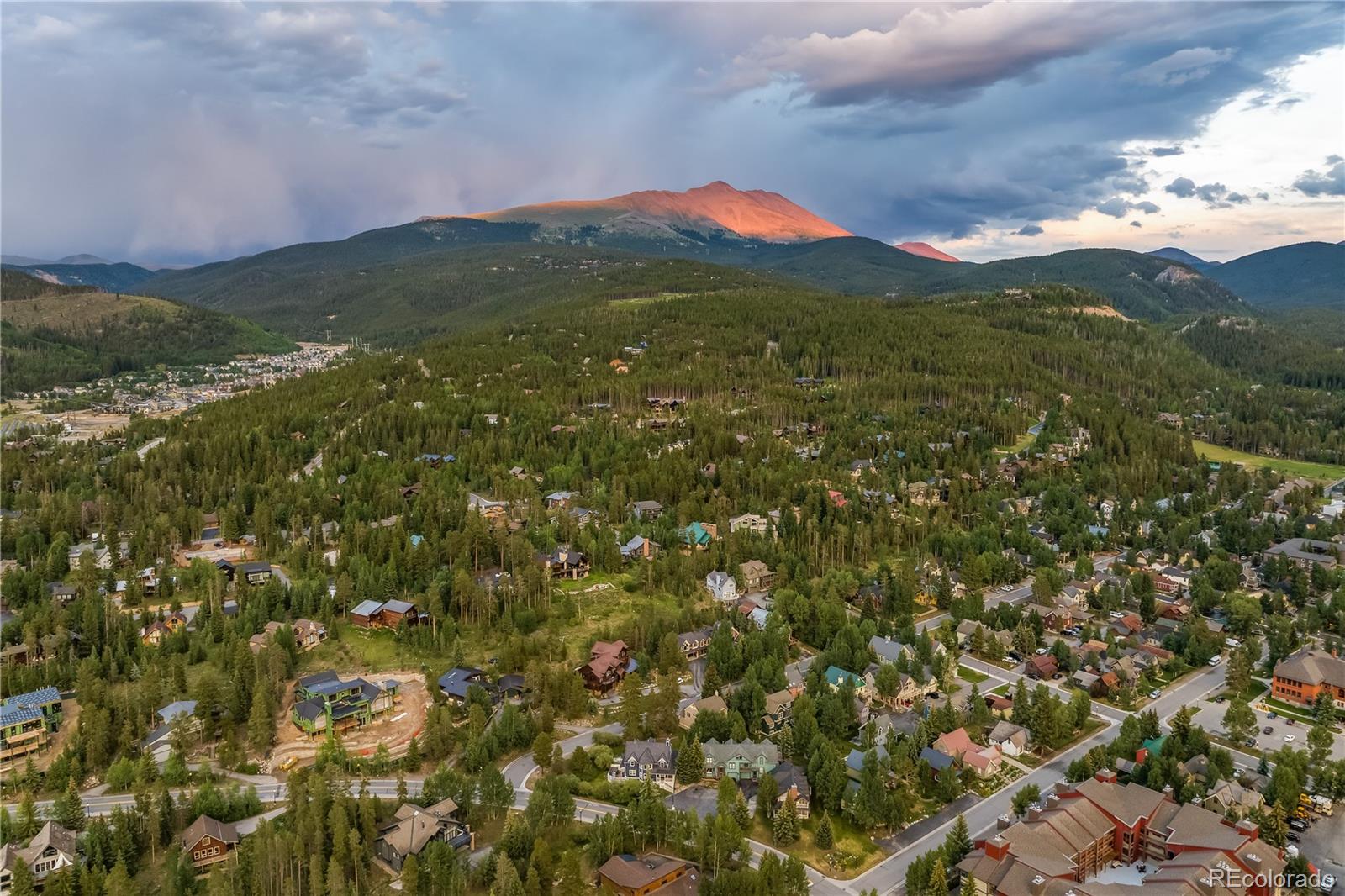 196 Wellington Road Breckenridge, CO 80424 - Photo 41 of 45 a view of a city with lush green forest