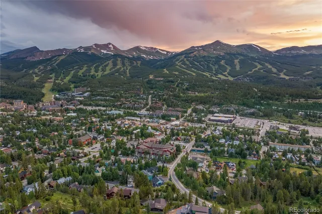 a view of mountains and valleys
