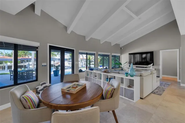 a bed room with a bed and a television