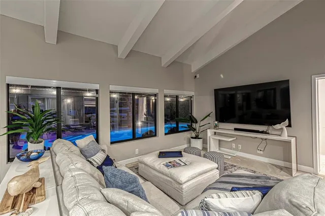 a bedroom with a bed and lamp