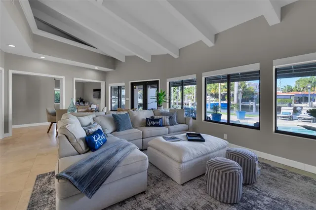 a bedroom with a large bed and a couch