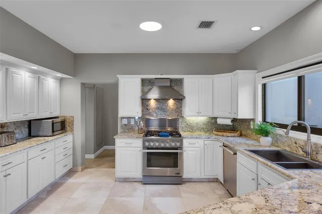 a outdoor living space with furniture and a garden