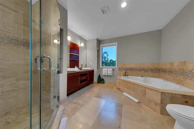 a view of a chairs and tables in the patio