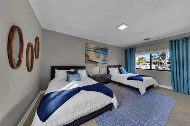 a view of a backyard with a patio table and chairs