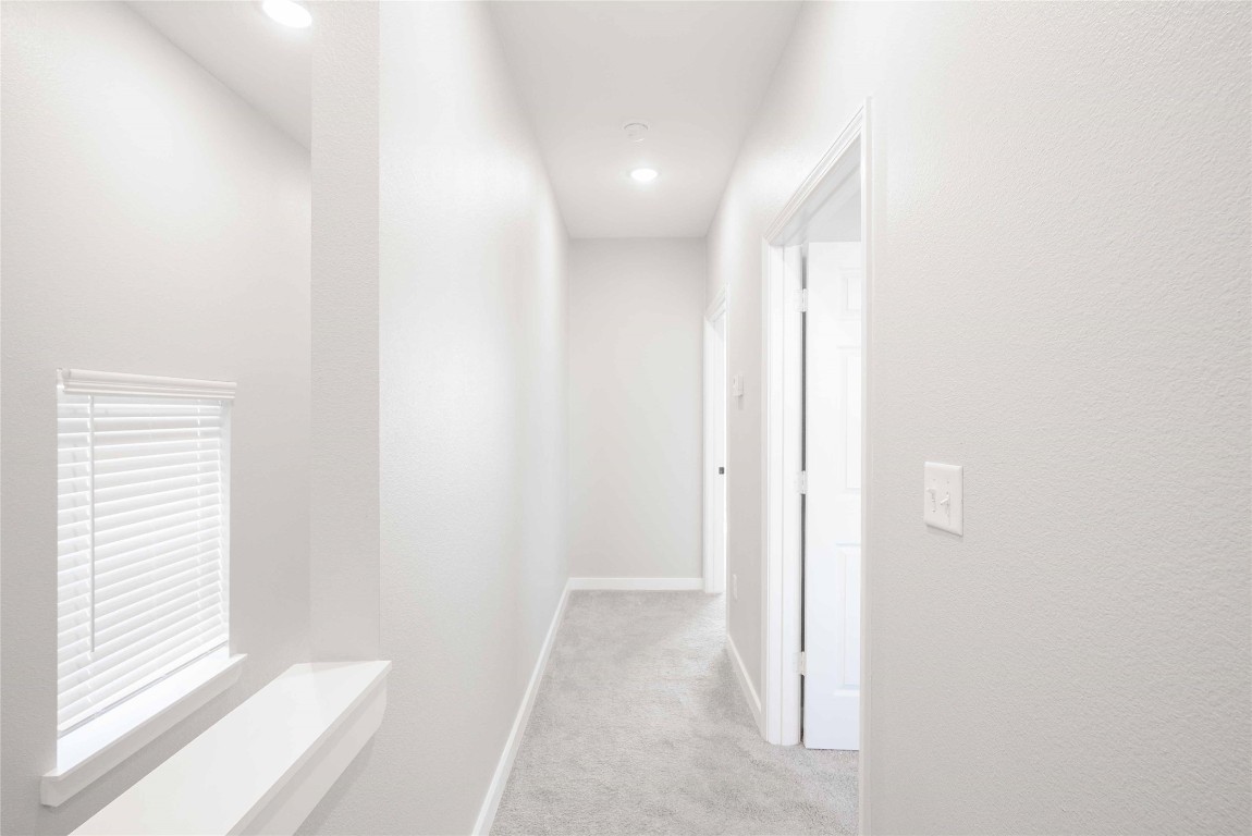 2101 Reinke Road, Unit 2105 Waller, TX 77484 - Photo 9 of 23 a view of a hallway