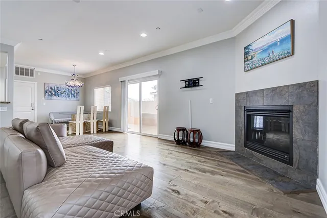 a bedroom with a bed and a fireplace