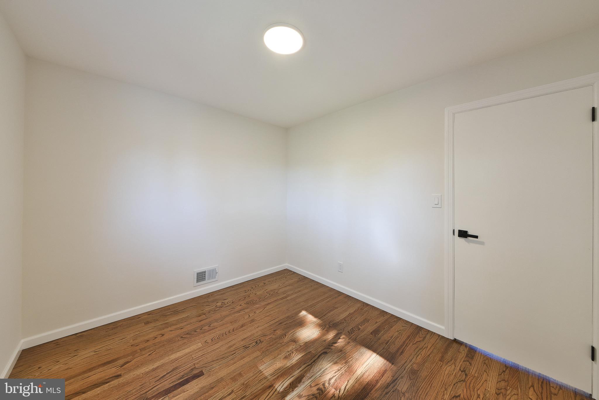 13 Sycamore Way Hamilton, NJ 08690 - Photo 22 of 37 a view of a room with wooden floor