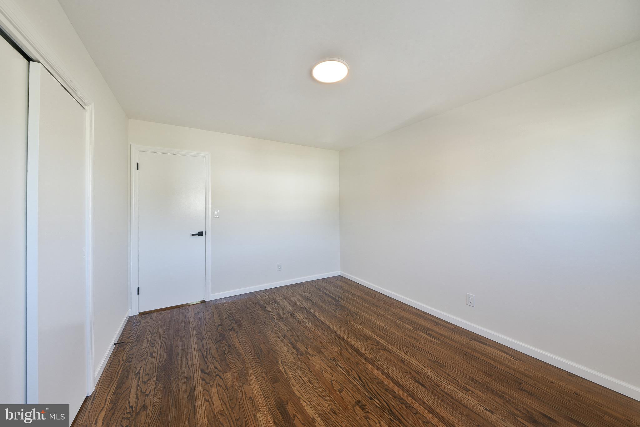 13 Sycamore Way Hamilton, NJ 08690 - Photo 24 of 37 a view of room with wooden floor