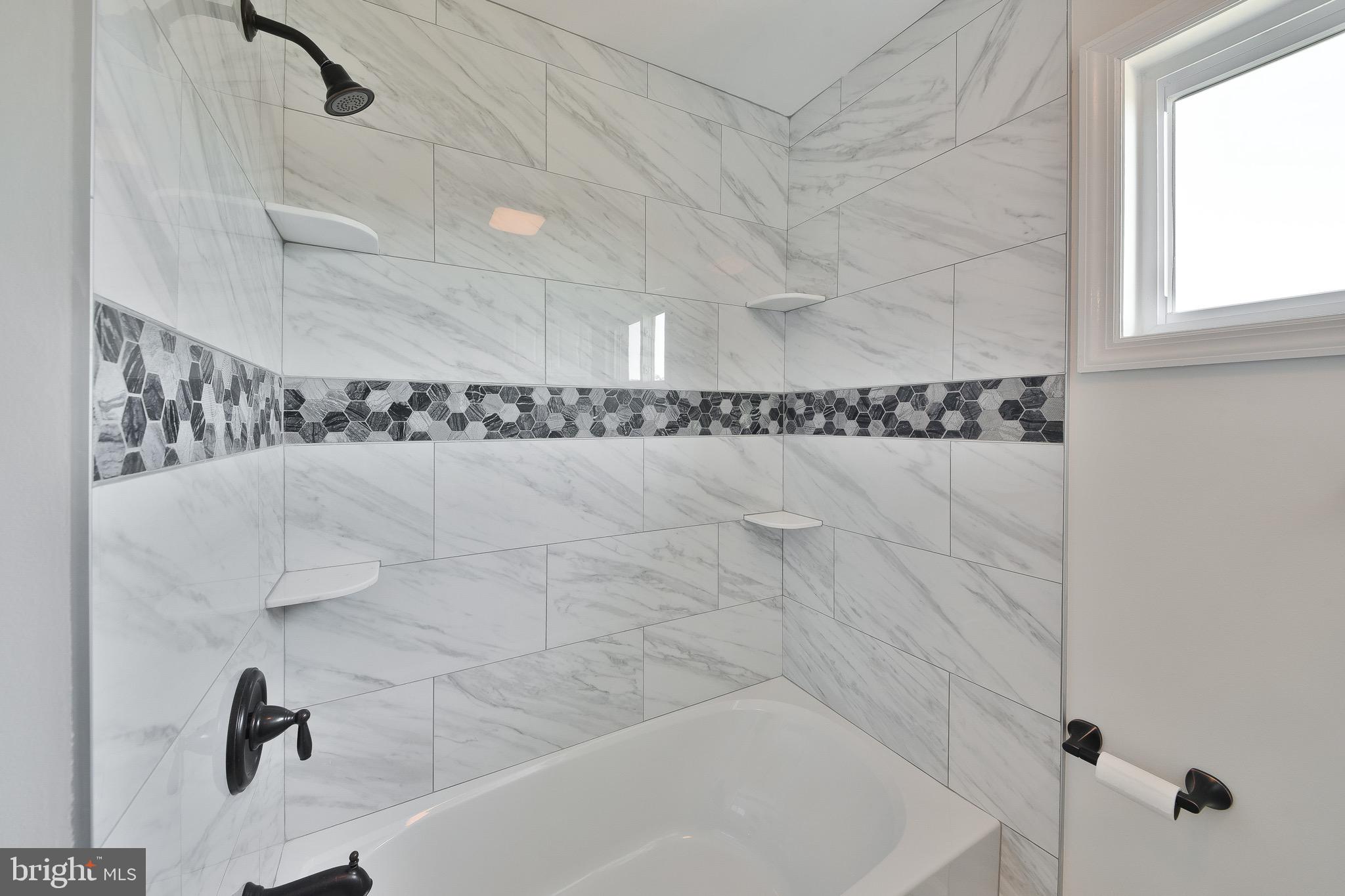 13 Sycamore Way Hamilton, NJ 08690 - Photo 29 of 37 a bathroom with a shower