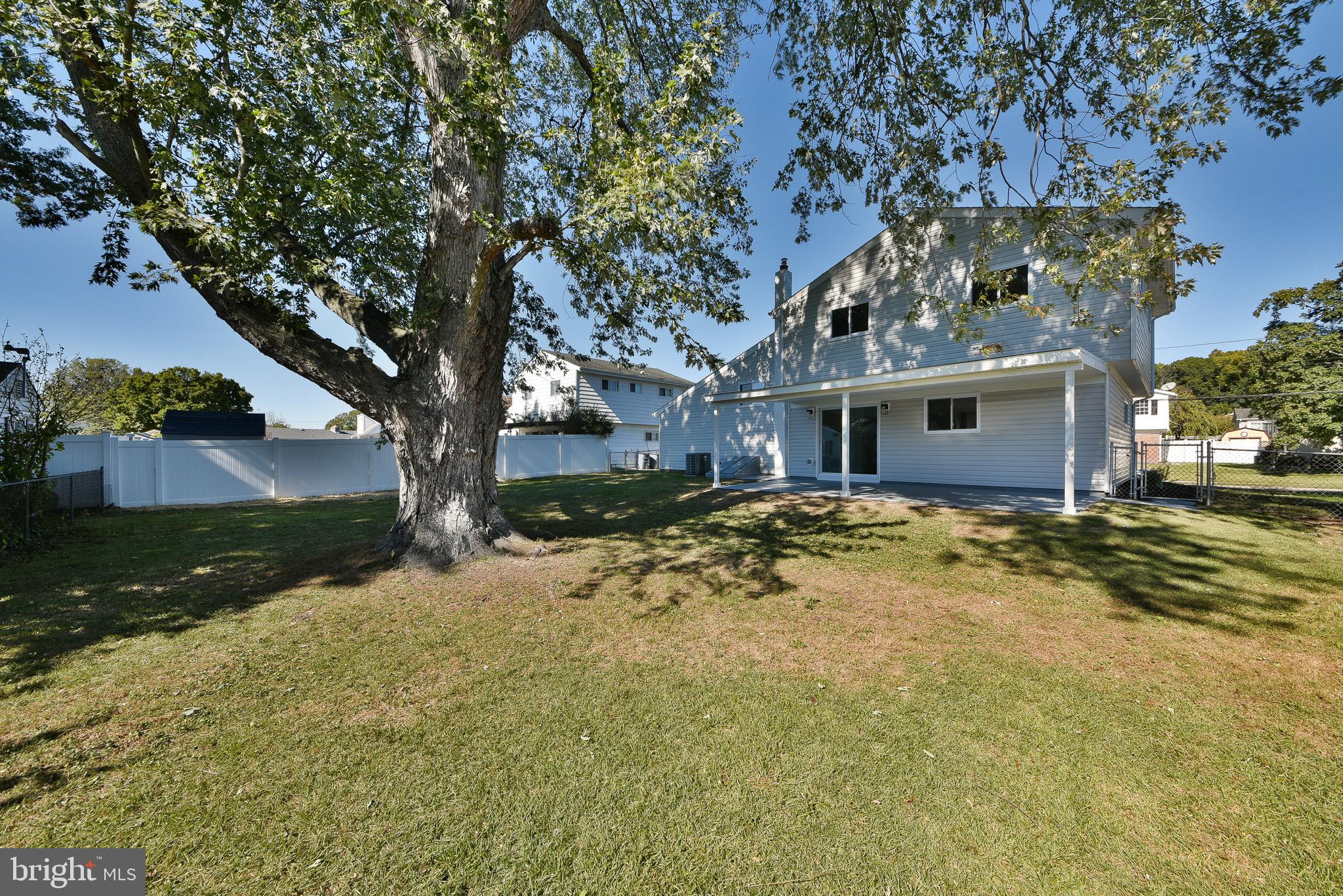 13 Sycamore Way Hamilton, NJ 08690 - Photo 32 of 37 a view of a house with a yard