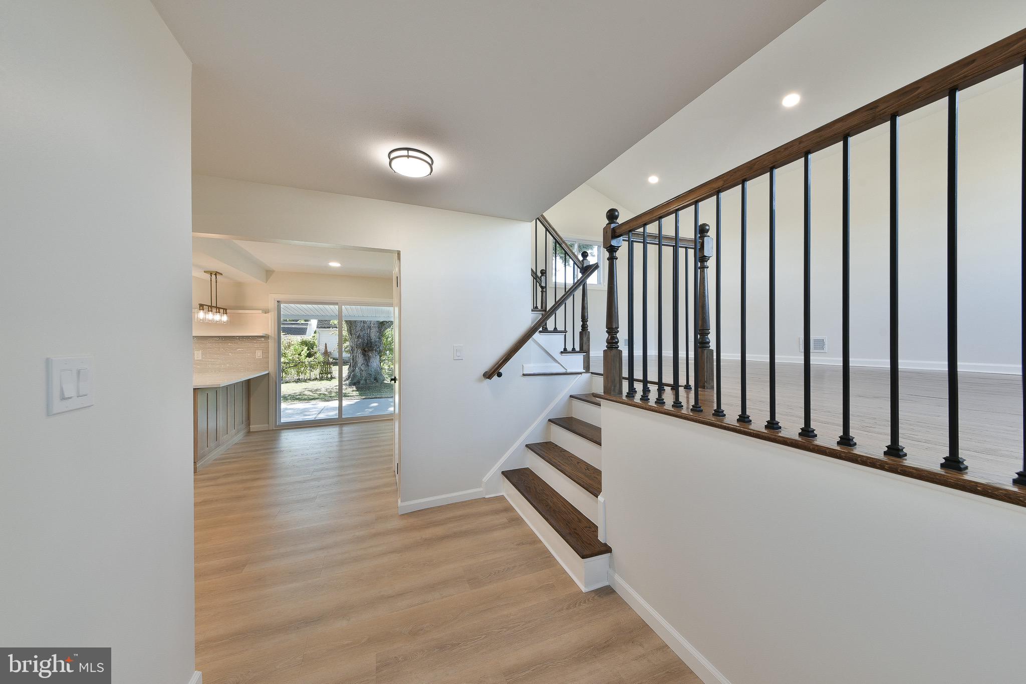 13 Sycamore Way Hamilton, NJ 08690 - Photo 5 of 37 a view of entryway and hall with wooden floor