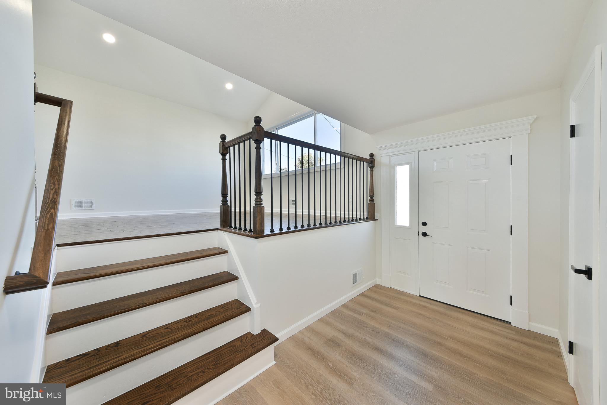13 Sycamore Way Hamilton, NJ 08690 - Photo 7 of 37 a view of a room with wooden floor and white walls