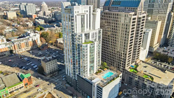 a view of city with tall buildings