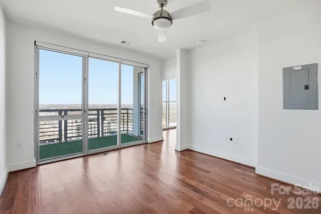 a outdoor space with lots of furniture and white walls