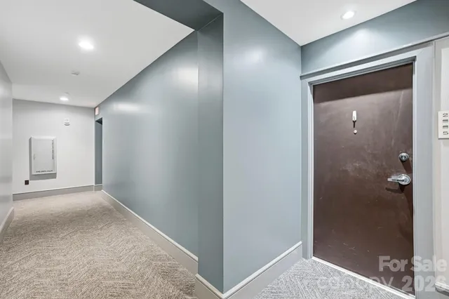 a kitchen with stainless steel appliances granite countertop a refrigerator stove and sink