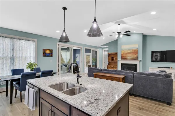a kitchen with sink cabinets and window