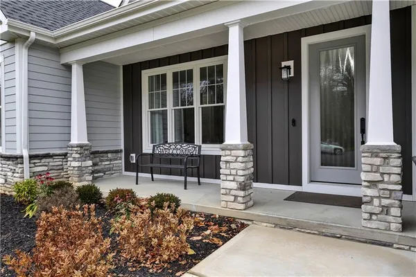a front view of a house with outdoor space