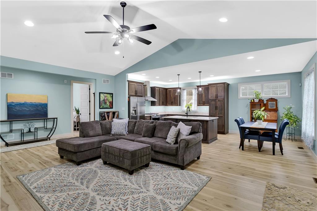 1316 South S Valley Export, PA 15632 - Photo 5 of 42 a living room with furniture and a flat screen tv with wooden floor