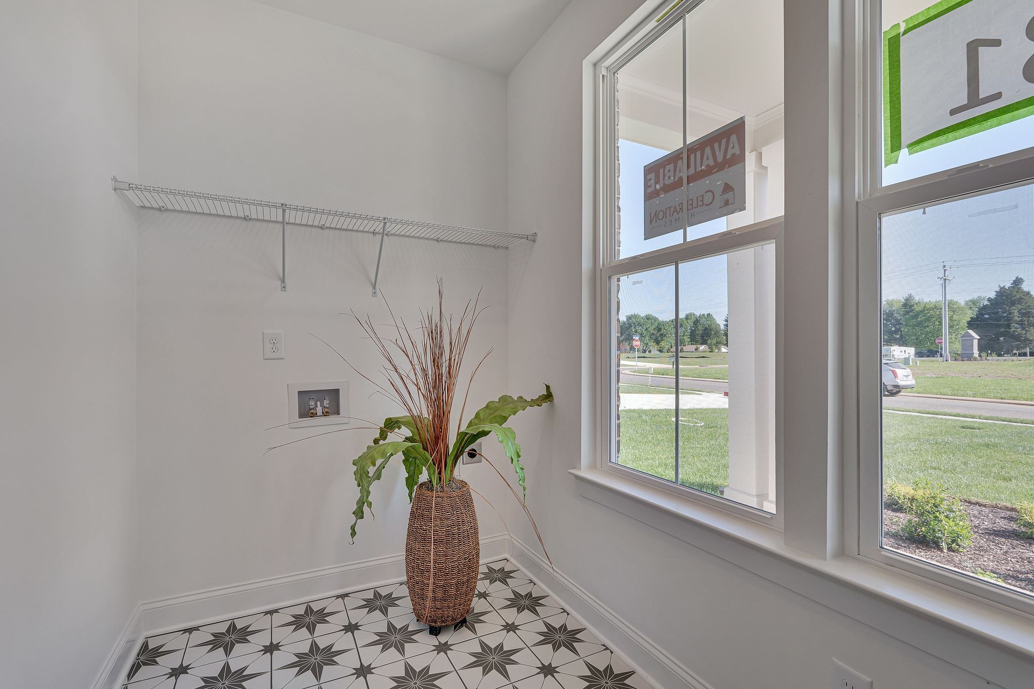 6826 Chatsworth Court Murfreesboro, TN 37129 - Photo 19 of 32 a potted plant sitting in front of a window