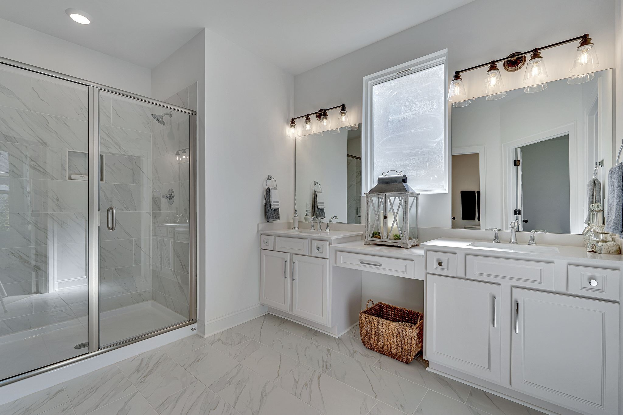 6826 Chatsworth Court Murfreesboro, TN 37129 - Photo 23 of 32 a bathroom with a shower sink and mirror