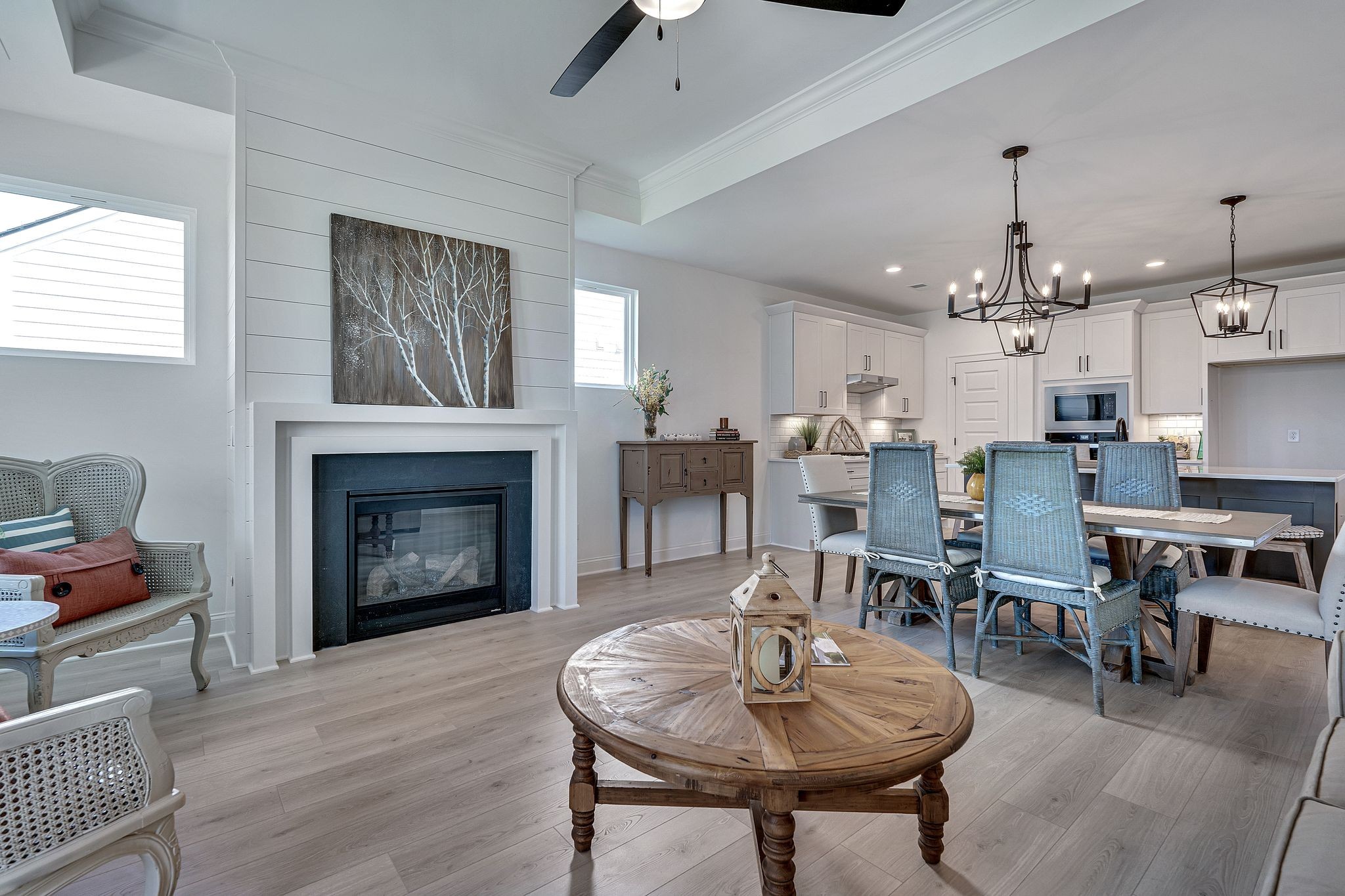 6826 Chatsworth Court Murfreesboro, TN 37129 - Photo 7 of 32 a living room with furniture a table and kitchen view