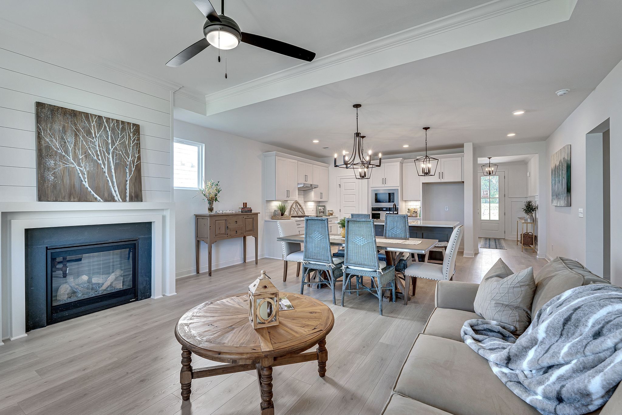 6826 Chatsworth Court Murfreesboro, TN 37129 - Photo 8 of 32 a living room with furniture kitchen view and a fireplace