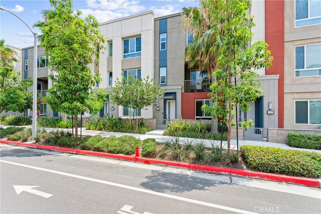 a view of a house with a street