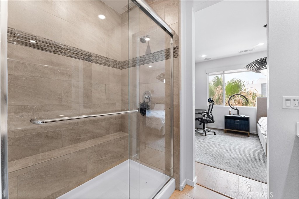 134 Citysquare Irvine, CA 92614 - Photo 24 of 32 a en suite bathroom with a shower