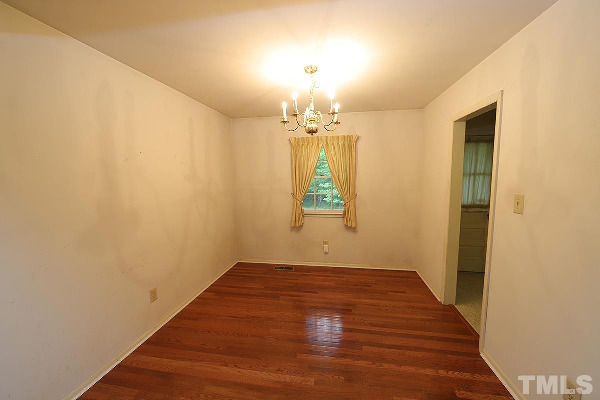 1337 Clermont Road Durham, NC 27713 - Photo 3 of 16 a view of a room with wooden floor