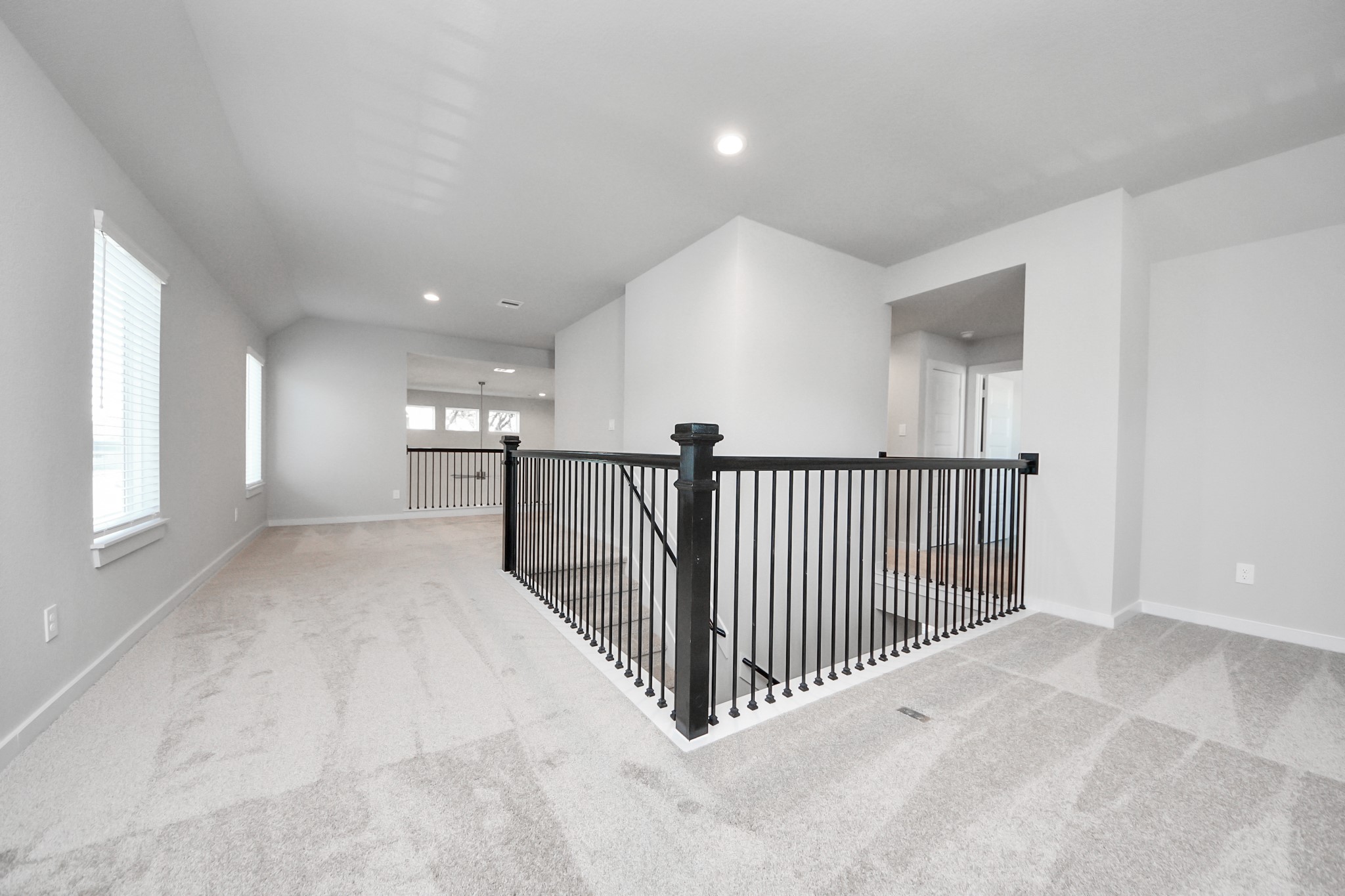 15719 Telge Ridge Lane Cypress, TX 77429 - Photo 32 of 48 a view of a hallway with windows