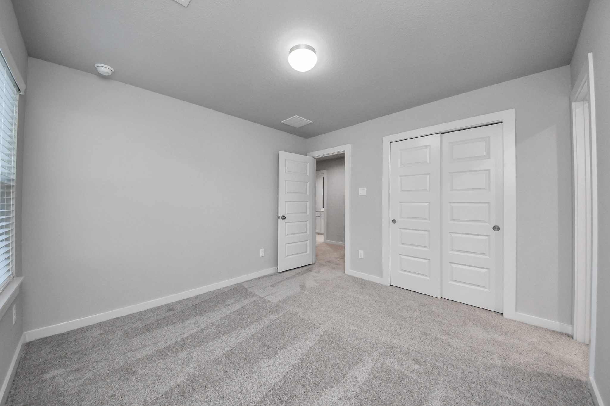 15719 Telge Ridge Lane Cypress, TX 77429 - Photo 34 of 48 an empty room with closet area