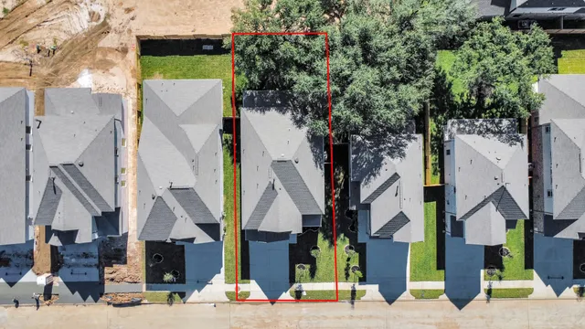 a view of a street with houses