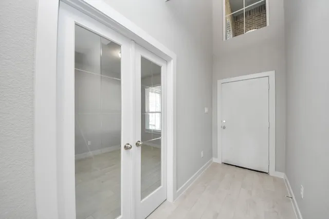 an empty room with windows