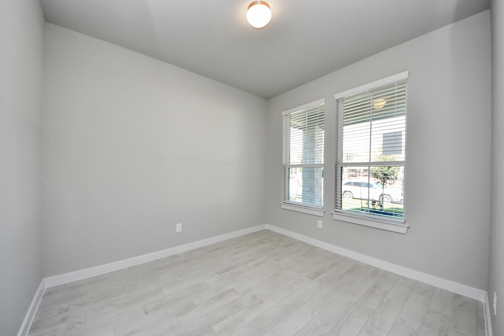 15719 Telge Ridge Lane Cypress, TX 77429 - Photo 9 of 48 an empty room with windows and with windows