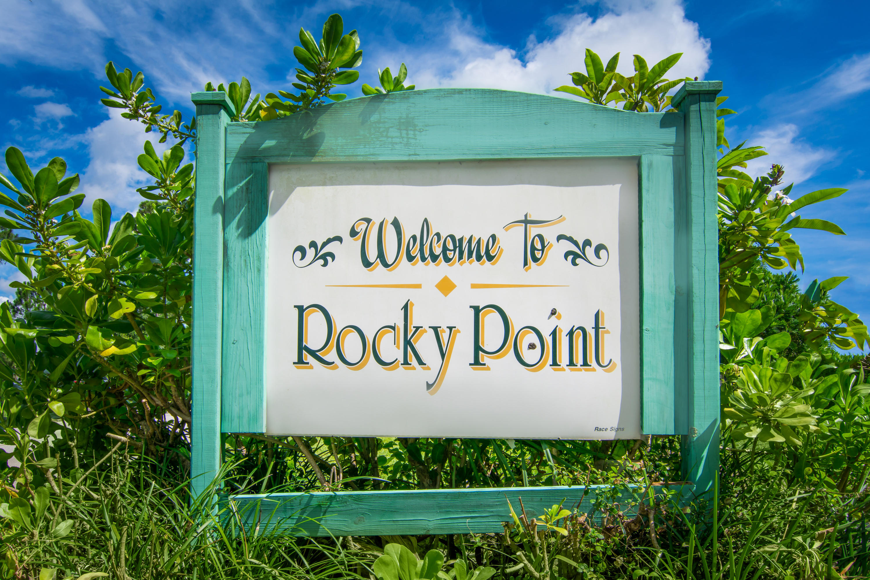 4870 Southeast Manatee Cove Road Stuart, FL 34997 - Photo 1 of 45 Entrance of neighborhood