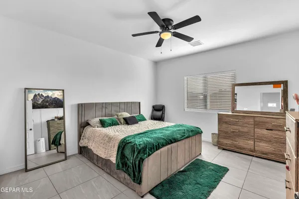 a view of a workspace with furniture and closet