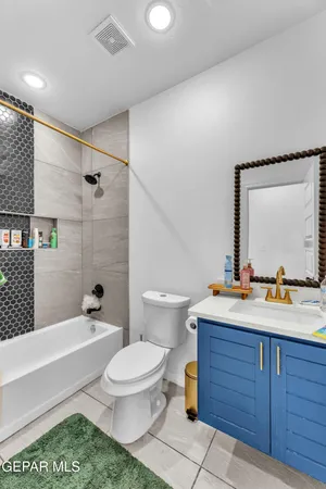 a bathroom with a shower and a tub