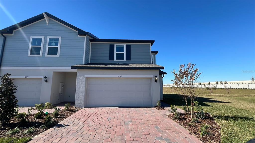 16360 Happy Eagle Drive Clermont, FL 34714 - Photo 1 of 1 a house view with a backyard space