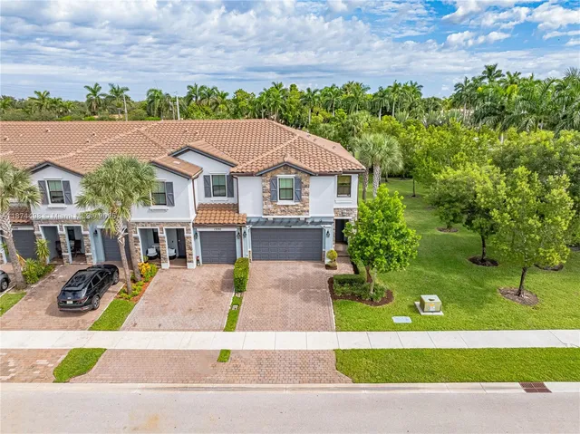 a view of house with yard