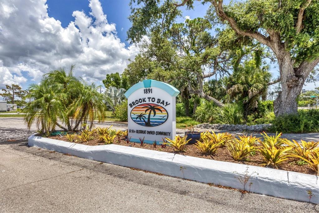 1891 Englewood Road, Unit 1 Englewood, FL 34223 - Photo 31 of 46 a view of a park with iron fence