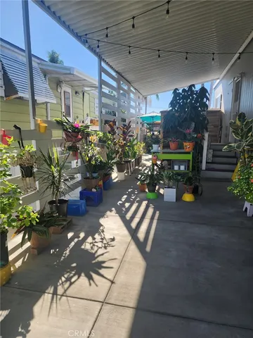 a view of a chairs and tables in the patio